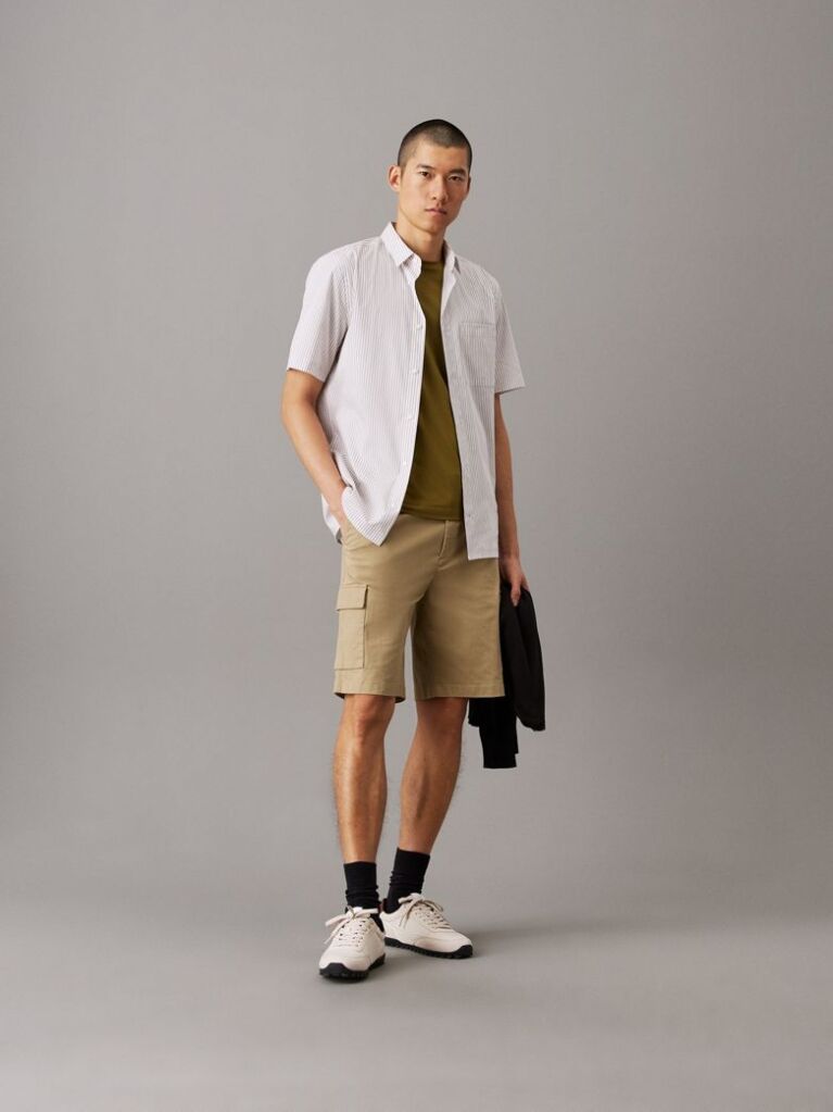 Blue Modern. Sharp. Innovative. Calvin Klein Menswear offers a premium selection of men's styles from tailored suits to luxury sportswear. These shorts are crafted with 51% certified organic cotton, which is grown free from synthetic pesticides, synthetic fertilizers and genetically modified seeds.  Men